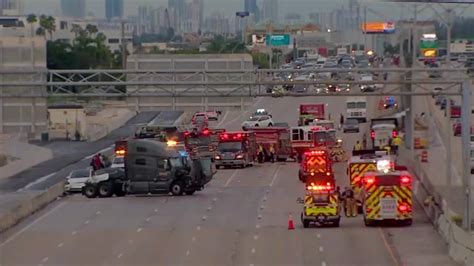 1 hospitalized after tractor-trailer, 3 cars collide on I-95 near Dania Beach, causing fuel spill